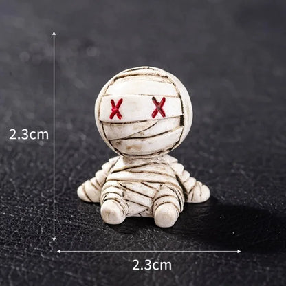 Mini figurine in resina